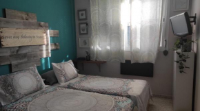 habitación doble con aseo compartido